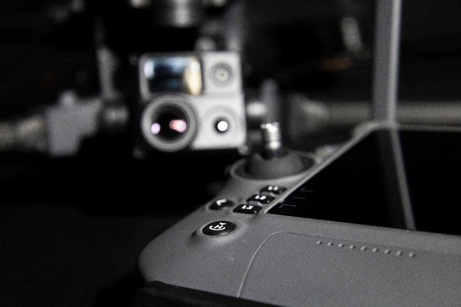 Close-up of thermal drone camera and controller at night